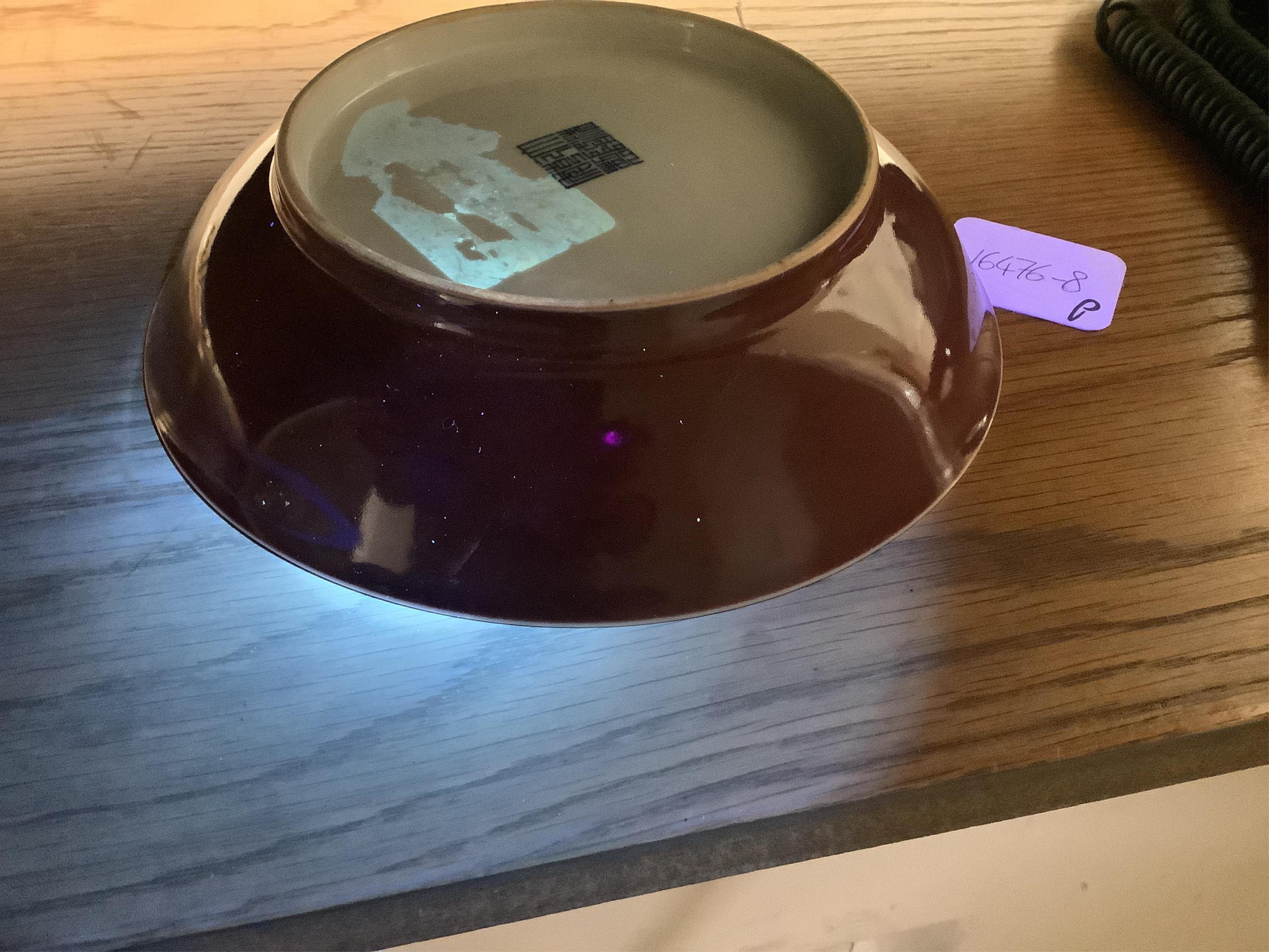 A Chinese copper-red glazed saucer dish, Qianlong six-character seal mark and of the period (1736-95)